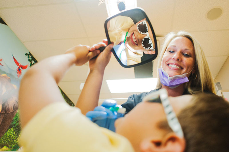 Child with mirror